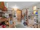 Spacious basement storage area featuring shelving and access to other rooms, perfect for organization at 432 King Way, Tavares, FL 32778