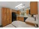 Functional kitchen featuring efficient appliances, ample storage space, and a breakfast bar at 432 King Way, Tavares, FL 32778