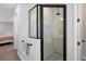 Modern bathroom features a glass enclosed shower and stylish hardware at 4515 Lions Gate Ave, Clermont, FL 34711