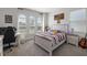 Bedroom boasts multiple windows, a desk area, and plenty of space for decor at 4515 Lions Gate Ave, Clermont, FL 34711