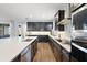 Beautiful kitchen with a large island, stainless steel appliances and lots of counter space at 4515 Lions Gate Ave, Clermont, FL 34711