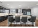 Stylish kitchen boasts a large island, stainless steel appliances, and ample cabinet space at 4515 Lions Gate Ave, Clermont, FL 34711