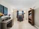 Well-lit home office with a desk, bookcase, neutral walls, and a large window with a view at 500 Newell Hill Rd # 111A, Leesburg, FL 34748