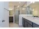 This bathroom features a double sink and walk-in shower at 5024 Balsam Falls Rd, Deland, FL 32724
