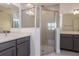 This bathroom features a double sink and walk-in shower at 5024 Balsam Falls Rd, Deland, FL 32724