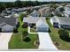 Well-maintained home with manicured landscaping and a welcoming driveway at 508 Carrera Dr, The Villages, FL 32159