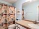 Bathroom features a shower and tub combination, with modern fixtures and ample counter space at 508 Carrera Dr, The Villages, FL 32159