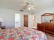 Comfortable main bedroom with a view of the ensuite and walk in closet, providing space and convenience at 508 Carrera Dr, The Villages, FL 32159