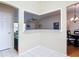 Dining area and living room showcased with a pass through design for seamless flow and connectivity at 508 Carrera Dr, The Villages, FL 32159