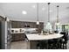 Bright, spacious kitchen with a large center island and stainless steel appliances at 5220 Horsford Path, The Villages, FL 32163