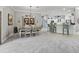 Open concept dining area features a decorative hutch with views into the kitchen and a breakfast bar at 575 Wheelock St, The Villages, FL 32163