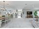 Spacious and bright living area with an open floor plan that provides seamless transitions between rooms at 575 Wheelock St, The Villages, FL 32163