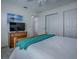 Bright bedroom with plush carpeting, an entertainment center, and a relaxing atmosphere at 633 Jameston Ave, The Villages, FL 32162