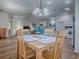 Inviting open layout connecting the dining area, living room, and kitchen for easy entertaining and everyday living at 633 Jameston Ave, The Villages, FL 32162
