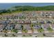 Aerial view of a single Gathering home highlighting the backyard and nearby homes at 677 Brooks Field Dr, Winter Garden, FL 34787