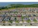 Lakeside community showcases an array of homes with well-manicured lawns and mature trees at 677 Brooks Field Dr, Winter Garden, FL 34787