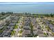 Scenic view of a lakeside community with well-spaced homes and verdant landscaping at 677 Brooks Field Dr, Winter Garden, FL 34787
