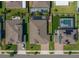 Overhead view of backyard pools and manicured green spaces in a peaceful residential neighborhood at 677 Brooks Field Dr, Winter Garden, FL 34787
