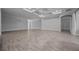 Bright and spacious living room showcasing the floor and ceiling details at 677 Brooks Field Dr, Winter Garden, FL 34787