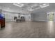Spacious open-concept living area with gourmet kitchen and coffered ceilings at 677 Brooks Field Dr, Winter Garden, FL 34787