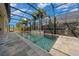 A full pool shot featuring a screened enclosure with a fountain feature at 677 Brooks Field Dr, Winter Garden, FL 34787