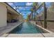 An angled shot of the pool and lanai area, highlighting the fountain feature at 677 Brooks Field Dr, Winter Garden, FL 34787