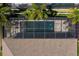 Aerial view of the screened-in pool and patio, showing the pool's size and design at 677 Brooks Field Dr, Winter Garden, FL 34787