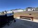 Wide backyard featuring a grill and bench at 6846 Wilson Hammock Ave, Groveland, FL 34736