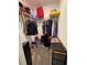 Walk-in closet providing ample storage with wire shelving and organized clothing at 6846 Wilson Hammock Ave, Groveland, FL 34736