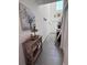 Bright entryway with a high ceiling, decor and a view of the front door at 6846 Wilson Hammock Ave, Groveland, FL 34736
