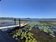 The community includes lake access with a new dock and scenic views of the water at 6846 Wilson Hammock Ave, Groveland, FL 34736
