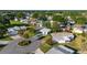 An aerial view showcases the community's well-manicured lawns and cul-de-sac at 728 Tangerine Dr, The Villages, FL 32159