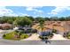 Lovely home with a screened-in pool, a patio with a fire pit, and a well-maintained front yard at 850 Oviedo Rd, Lady Lake, FL 32159