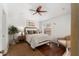 Cozy bedroom with natural light, side table, and a comfy rug at 850 Oviedo Rd, Lady Lake, FL 32159