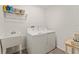 Bright laundry room with modern washer and dryer at 947 Couture St, The Villages, FL 32163