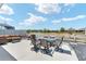 Outdoor patio with ample seating and views of the community at 947 Couture St, The Villages, FL 32163