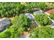 Overhead view showing the property's boundary lines and its location among mature trees at 10851 Lantana Crst, Clermont, FL 34711