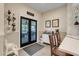 Bright kitchen nook with views of the patio and stylish coffee station with outdoor access at 10851 Lantana Crst, Clermont, FL 34711