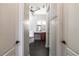 Bathroom entryway with tile floors, tub, and vanity sink at 1196 Lakeshore Dr, Mount Dora, FL 32757