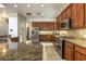 Gourmet kitchen features granite countertops, stainless steel appliances, and recessed lighting at 1196 Lakeshore Dr, Mount Dora, FL 32757