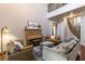 Elegant living room boasts high ceilings, hardwood floors, stylish furniture and a stairway at 1196 Lakeshore Dr, Mount Dora, FL 32757