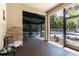 Covered patio space with comfortable seating and views of the serene surroundings at 1196 Lakeshore Dr, Mount Dora, FL 32757