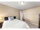 Relaxing bedroom with carpet, and side table offer a comfortable place to rest and a private retreat at 13045 Colonnade Cir, Clermont, FL 34711