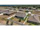 Aerial view of the property showcasing backyard and neighborhood homes at 13328 Lake Yale View Loop, Grand Island, FL 32735