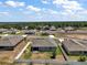 An aerial view of the property featuring backyard and neighborhood setting at 13328 Lake Yale View Loop, Grand Island, FL 32735
