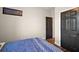 Bright bedroom with modern flooring and a stylish accent at 13328 Lake Yale View Loop, Grand Island, FL 32735