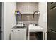 Efficient laundry room with modern washer and dryer at 13328 Lake Yale View Loop, Grand Island, FL 32735