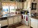 Efficient kitchen space with ample counter space, making it ideal for cooking and meal preparation at 1616 Lauren Ln, Lady Lake, FL 32159