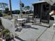 Inviting outdoor patio area with a white picket fence, perfect for relaxing and enjoying the fresh air at 1616 Lauren Ln, Lady Lake, FL 32159