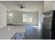 Open concept living area featuring a kitchen island and plenty of light at 16487 Sw 55Th, Ocala, FL 34473